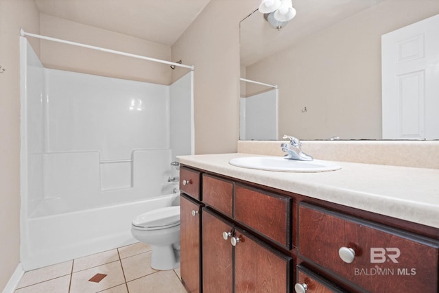 10966 Brighton Dr, Chunchula, AL 36521 - bathroom featuring tile patterned floors, vanity, toilet, and shower / washtub combination