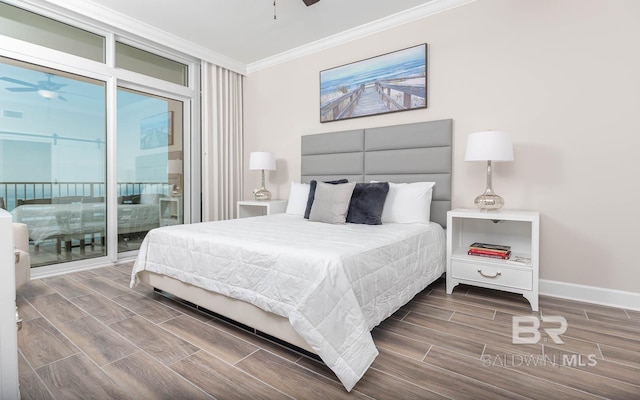 bedroom featuring access to outside, wood finish floors, ornamental molding, and baseboards