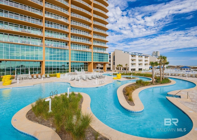 community pool featuring a patio