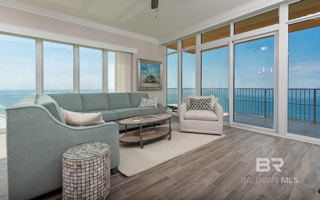 sunroom with a water view