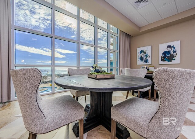 dining room with visible vents and a wealth of natural light