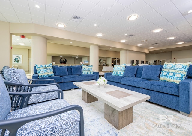 living area with recessed lighting and visible vents