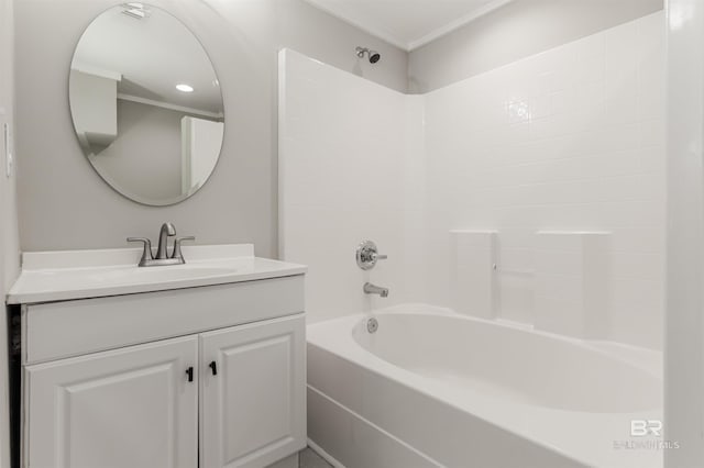 bathroom featuring shower / bath combination and vanity