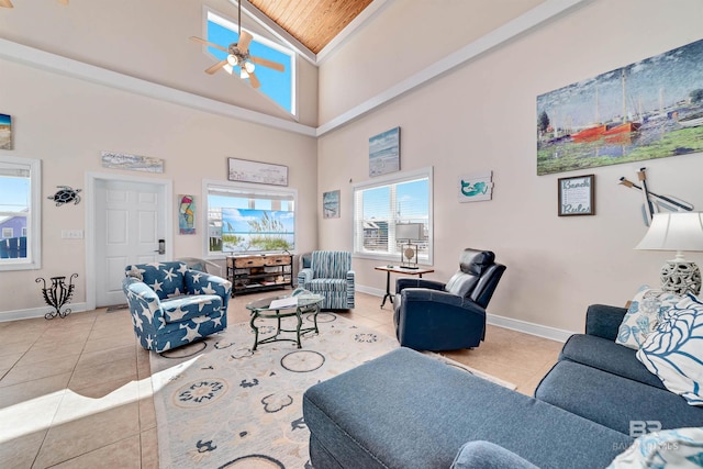 living room with baseboards, high vaulted ceiling, ceiling fan, and tile patterned floors