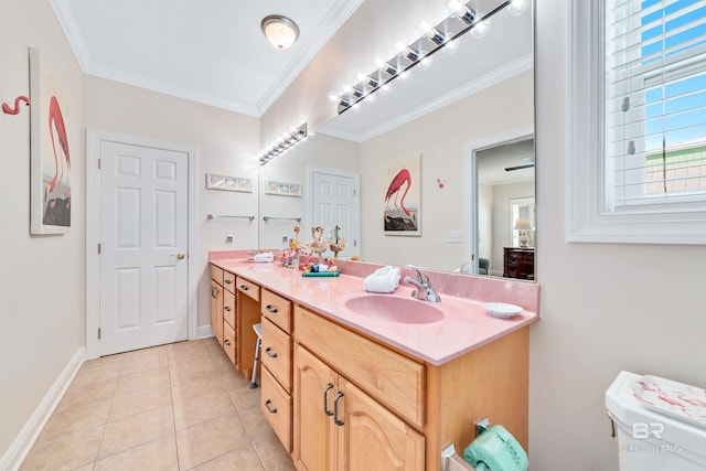 full bathroom with double vanity, tile patterned flooring, ornamental molding, and a sink