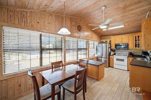 kitchen with light wood-type flooring, appliances with stainless steel finishes, wooden ceiling, ceiling fan, and lofted ceiling