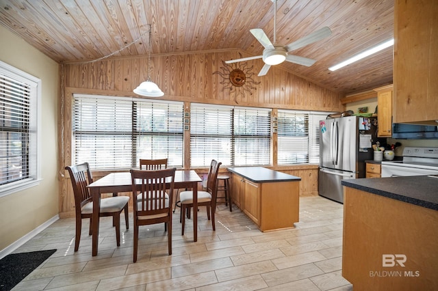 kitchen with a center island, wooden ceiling, ceiling fan, stainless steel appliances, and lofted ceiling