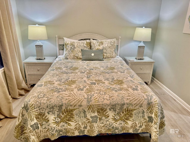 bedroom featuring light wood-type flooring