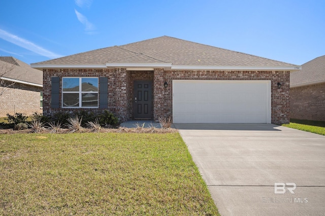 ranch-style home featuring brick siding, a shingled roof, concrete driveway, an attached garage, and a front lawn