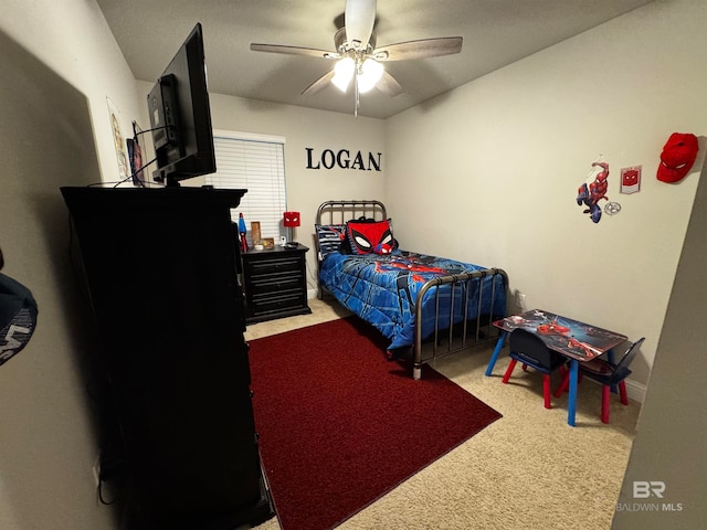 carpeted bedroom featuring ceiling fan