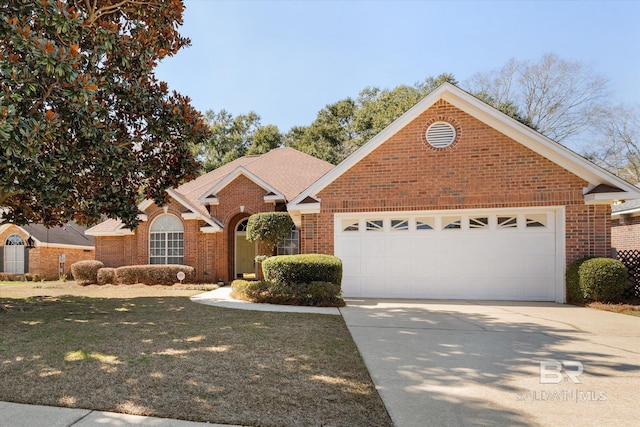 view of front of home with driveway, a garage, a shingled roof, brick siding, and a front yard