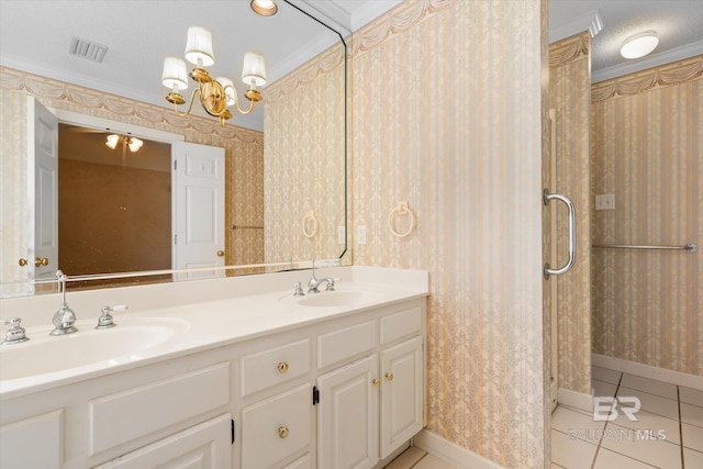 full bath featuring wallpapered walls, a sink, and tile patterned floors