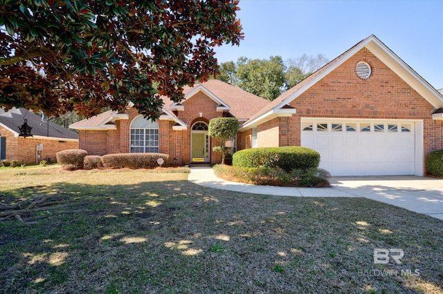 traditional-style house featuring an attached garage, brick siding, driveway, roof with shingles, and a front yard