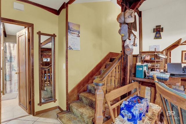 stairs featuring tile patterned flooring