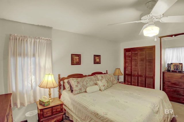 bedroom featuring a closet and ceiling fan