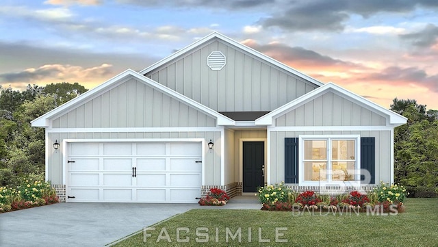 24926 Ponder Loop, Loxley, AL 36551 - view of front of property featuring an attached garage, driveway, board and batten siding, a lawn, and covered porch
