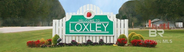 24926 Ponder Loop, Loxley, AL 36551 - community sign with a lawn