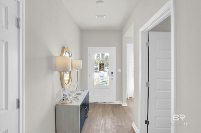24926 Ponder Loop, Loxley, AL 36551 - foyer entrance featuring light wood-type flooring and baseboards