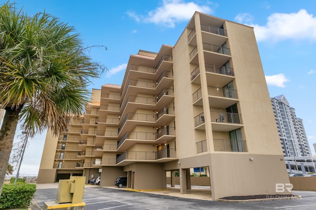 511 E Beach Blvd Unit 203, Gulf Shores, AL 36542 - view of property with uncovered parking