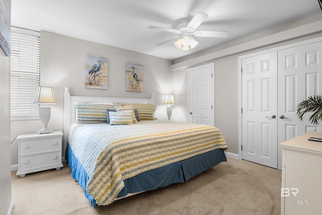 carpeted bedroom featuring ceiling fan