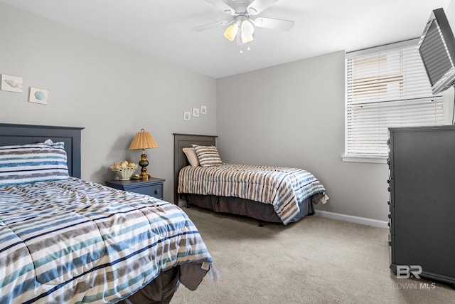 bedroom featuring ceiling fan and carpet floors