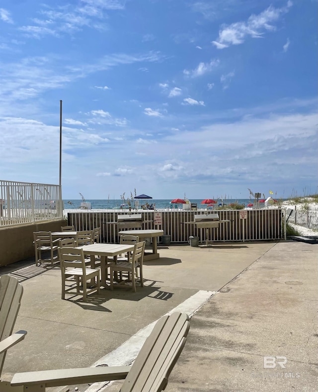 view of patio / terrace featuring a water view