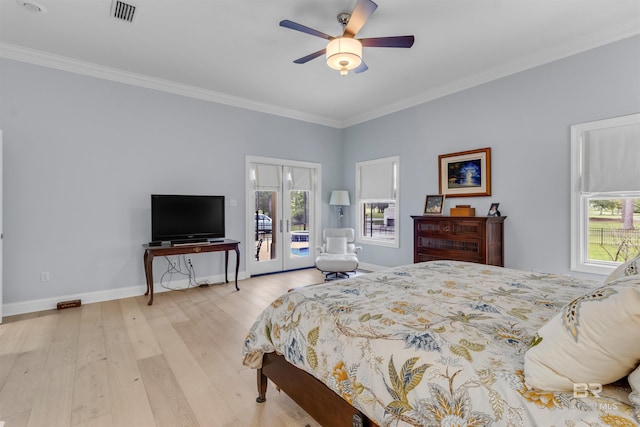 613 Wedgewood Dr, Gulf Shores, AL 36542 - bedroom with access to outside, light wood finished floors, ornamental molding, baseboards, and french doors