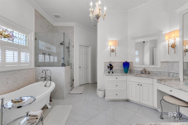 613 Wedgewood Dr, Gulf Shores, AL 36542 - bathroom featuring plenty of natural light, marble look tiles, a chandelier, a marble finish shower, and ornamental molding