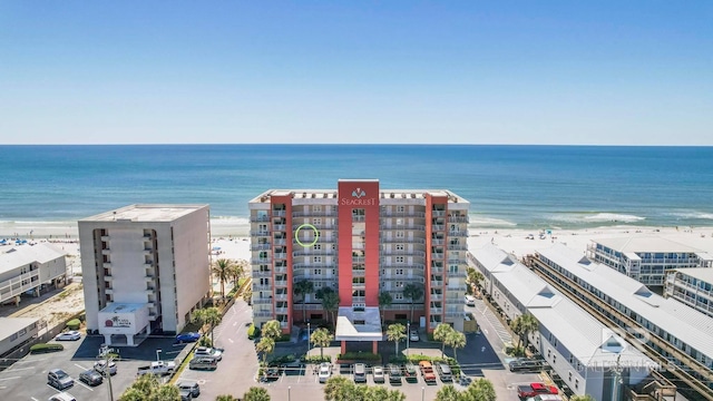 bird's eye view featuring a beach view and a water view