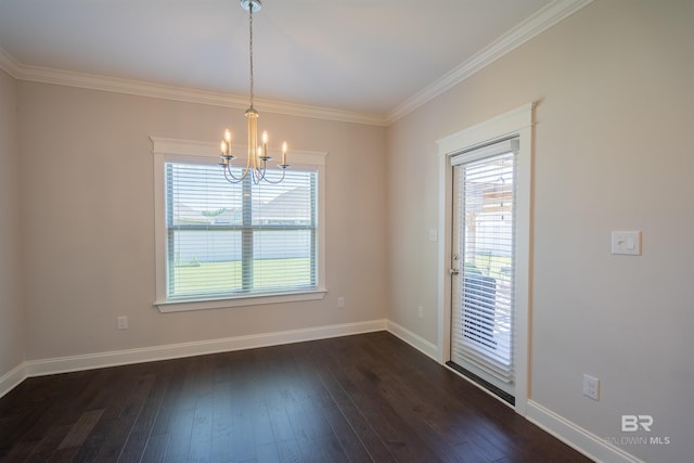 unfurnished dining area with dark hardwood / wood-style flooring, crown molding, and a notable chandelier