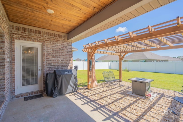 view of patio with a pergola and a grill