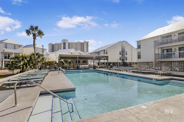 pool with a patio area