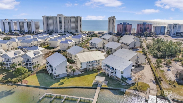 aerial view featuring a water view and a city view