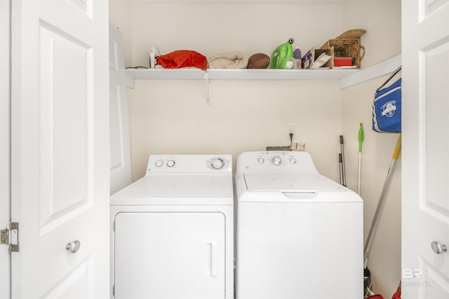 laundry area with laundry area and separate washer and dryer