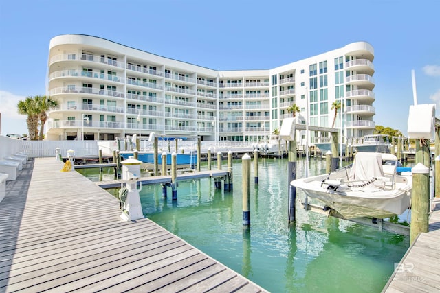 view of dock featuring a water view and boat lift