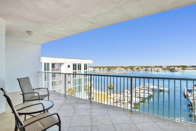 balcony featuring a water view