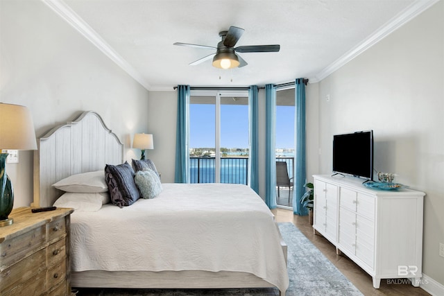 bedroom with baseboards, access to outside, a ceiling fan, and crown molding