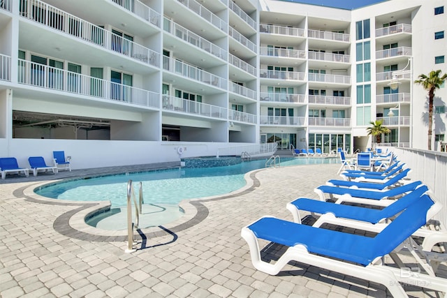 pool with a patio