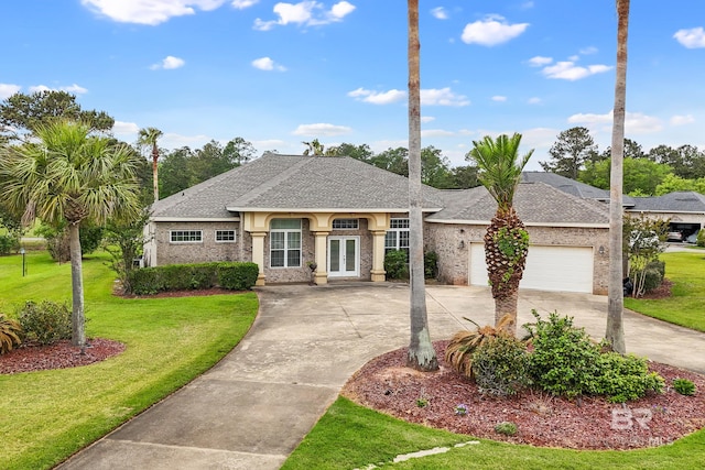 270 Cypress Lake Dr, Gulf Shores, AL 36542 - french country inspired facade with french doors, driveway, a front lawn, and an attached garage