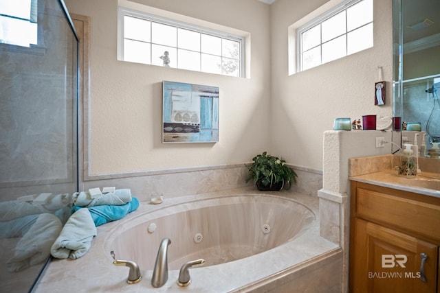 270 Cypress Lake Dr, Gulf Shores, AL 36542 - full bath with vanity, a jetted tub, and a shower