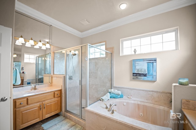 270 Cypress Lake Dr, Gulf Shores, AL 36542 - full bathroom featuring vanity, crown molding, a stall shower, a whirlpool tub, and healthy amount of natural light