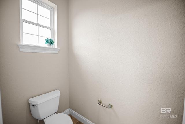 270 Cypress Lake Dr, Gulf Shores, AL 36542 - bathroom with toilet and baseboards