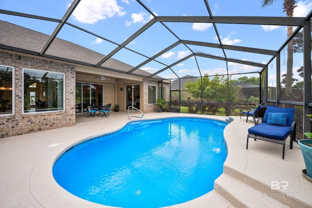 270 Cypress Lake Dr, Gulf Shores, AL 36542 - swimming pool featuring a patio, ceiling fan, and glass enclosure