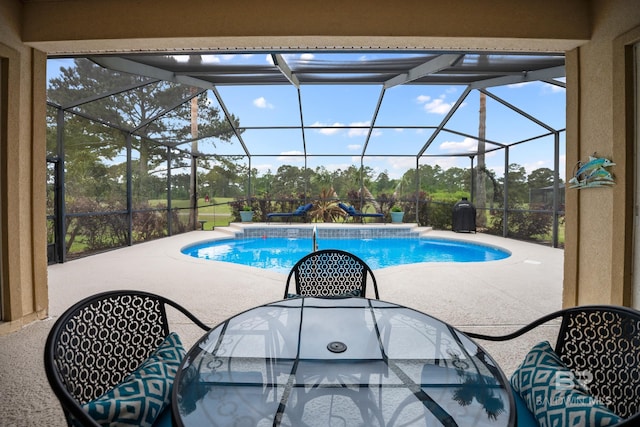 270 Cypress Lake Dr, Gulf Shores, AL 36542 - swimming pool with a patio area, a lanai, and view of scattered trees