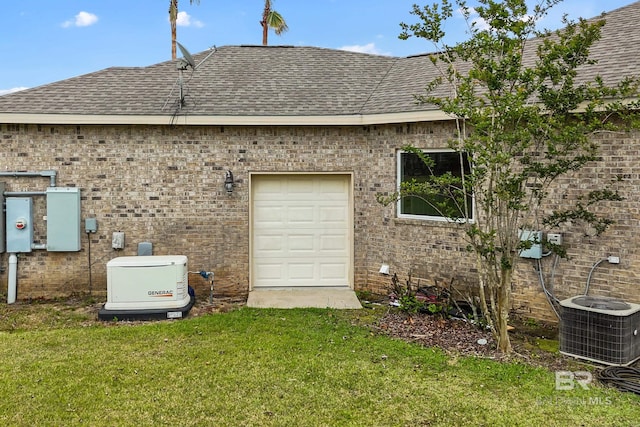 270 Cypress Lake Dr, Gulf Shores, AL 36542 - view of home's exterior featuring a shingled roof, a lawn, and brick siding