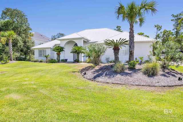 view of front facade with a front lawn