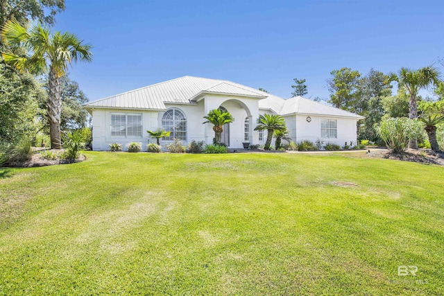 view of front of property with a front lawn