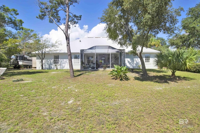 view of yard featuring a lanai