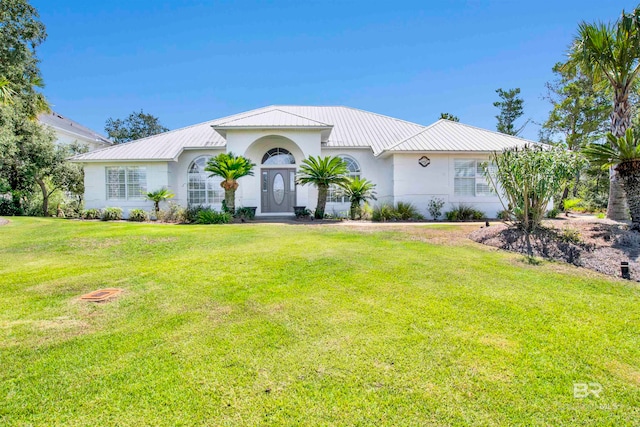 view of front of home with a front lawn