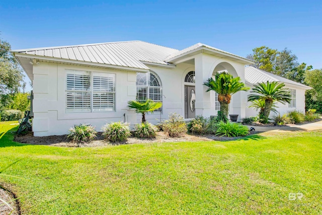 view of front of house with a front yard